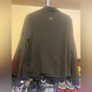 Lululemon Women’s size 6 black long sleeve athletic wear running top; high neck